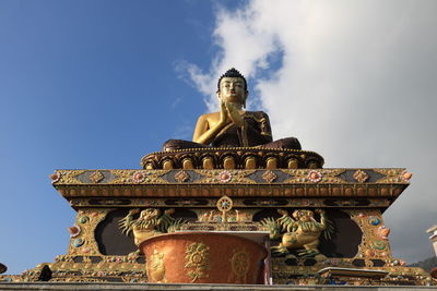 Low angle view of statue of temple