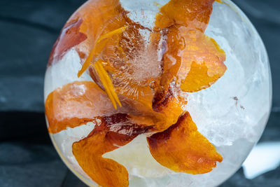 Crocosmia in ice ball