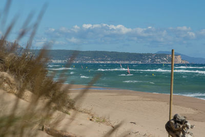 Scenic view of beach against sky