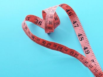 Close-up of information sign against clear sky