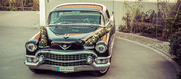 Close-up of vintage car on street