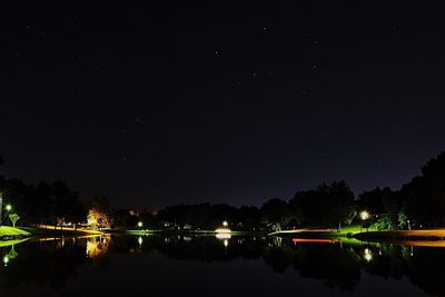 Scenic view of lake at night