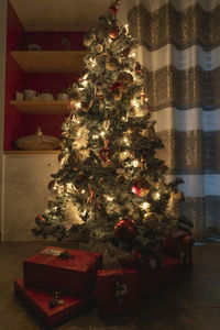 Illuminated christmas tree at home