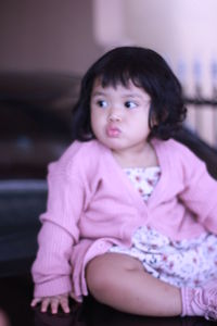 Portrait of a girl looking away