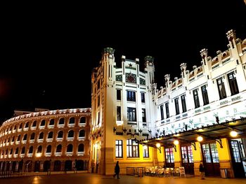 Low angle view of illuminated building at night