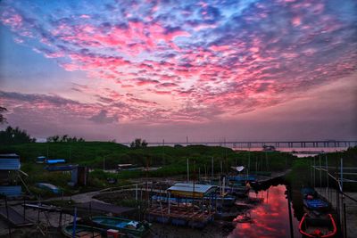 High angle view of boats moored at sunset