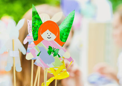 Fairy girl made of paper close-up with filter