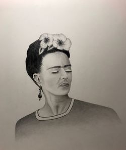 Portrait of young man against white background