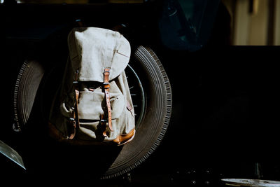 Backpack on car tire