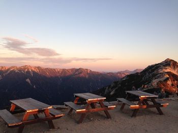 Scenic view of mountains against sky during sunset