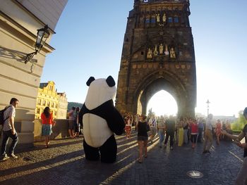 Tourists in front of building