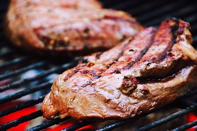 Close-up of meat on barbecue grill