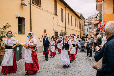 People on street in city