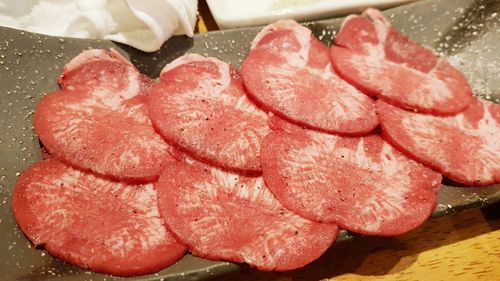 High angle view of chopped strawberries on table
