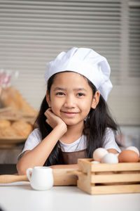 Portrait of a smiling girl with ice cream