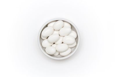 High angle view of eggs in white background