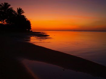 Scenic view of sea at sunset