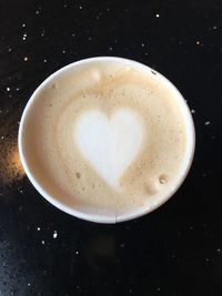 High angle view of cappuccino on table