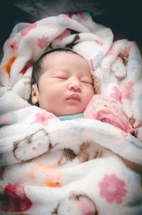 Close-up of cute baby sleeping