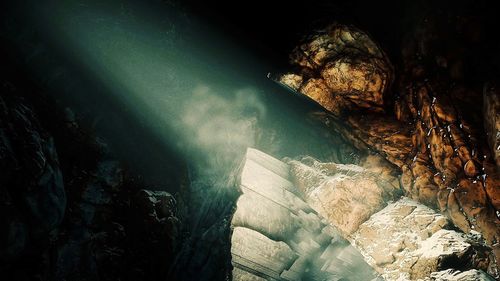 High angle view of rock formation in sea