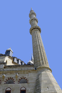 Low angle view of a building against blue sky