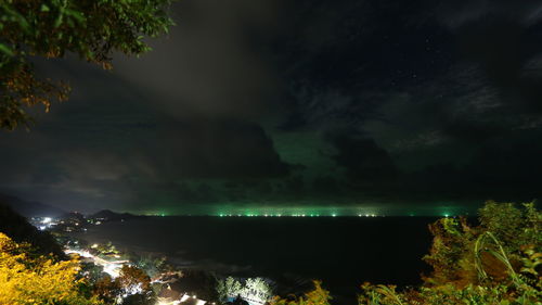 Scenic view of calm lake at night