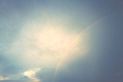 Low angle view of rainbow in sky