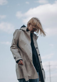 Woman standing against the sky