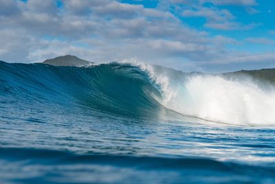 Sea wave against sky