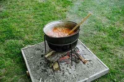 Romanian traditional food prepared at the cauldron on the open fire