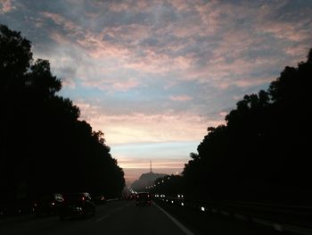 View of road against cloudy sky