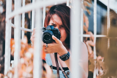 Portrait of man photographing