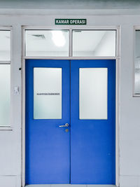 Text on blue door