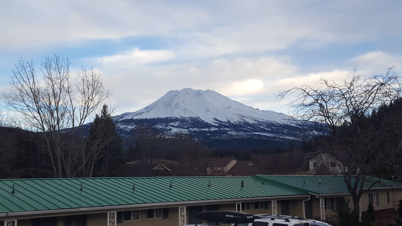 mountain, snow, winter, cold temperature, mountain range, sky, building exterior, snowcapped mountain, built structure, weather, architecture, house, season, cloud - sky, tree, scenics, landscape, beauty in nature, nature, cloud