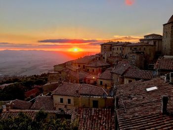 High angle view of townscape against sky at sunset