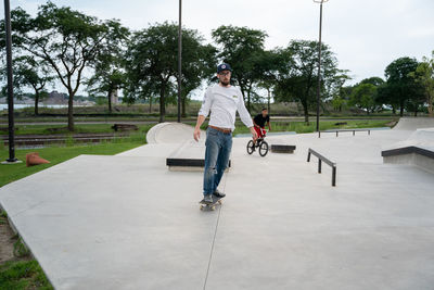 Man skateboarding on skateboard park