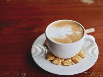 Close-up of cappuccino on table