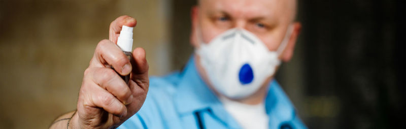 Cropped hand of woman holding cigarette