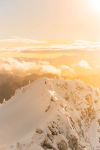 Scenic view of desert against sky during sunset
