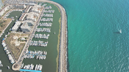 High angle view of text on beach by sea in city