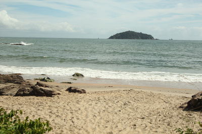 Scenic view of beach against sky