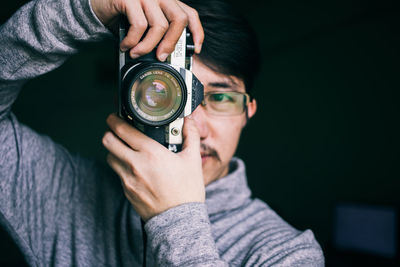 Portrait of man photographing