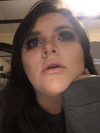 Close-up portrait of woman at home