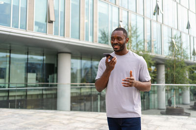 Young man using mobile phone