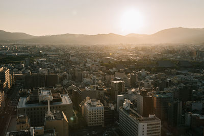 High angle view of townscape against sky during sunset