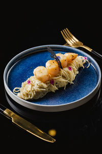 Close-up of food in plate on table