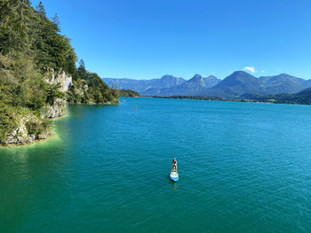 Scenic view of lake against blue sky