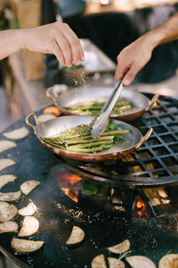 Midsection of person preparing food