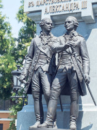 Low angle view of statue in city