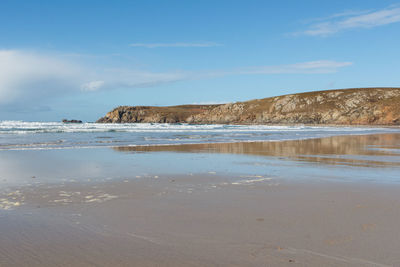 Scenic view of beach against sky